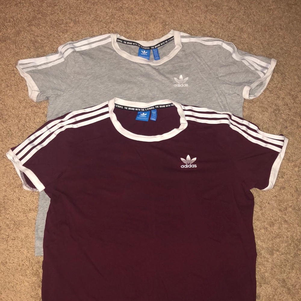 Two women’s adidas shirts